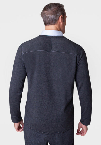 Man wearing a dark gray sweater on a white background